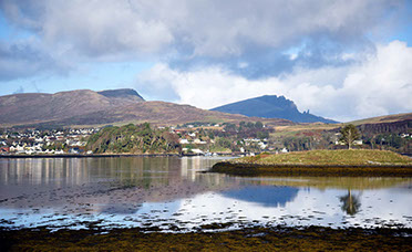 Scorr House is located on the shores of Loch Portree with sea and mountain views
